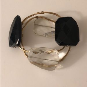 Black and clear quartz bangles (2)